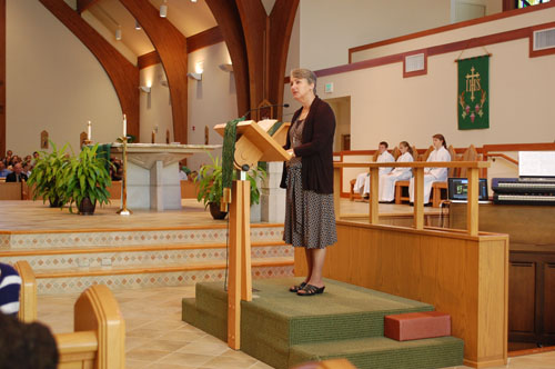 Debbie witnessing to the community of St. Alphonsus.